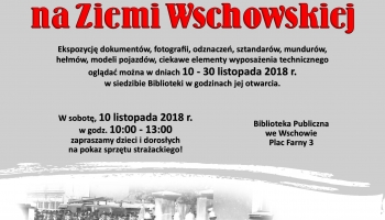 plakat ze zdjęciem strażaków